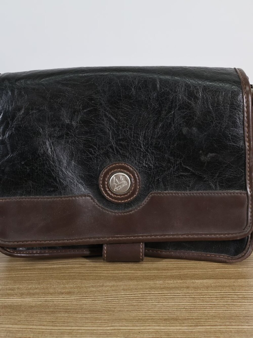 Mouflon vintage cross body leather hand bag.